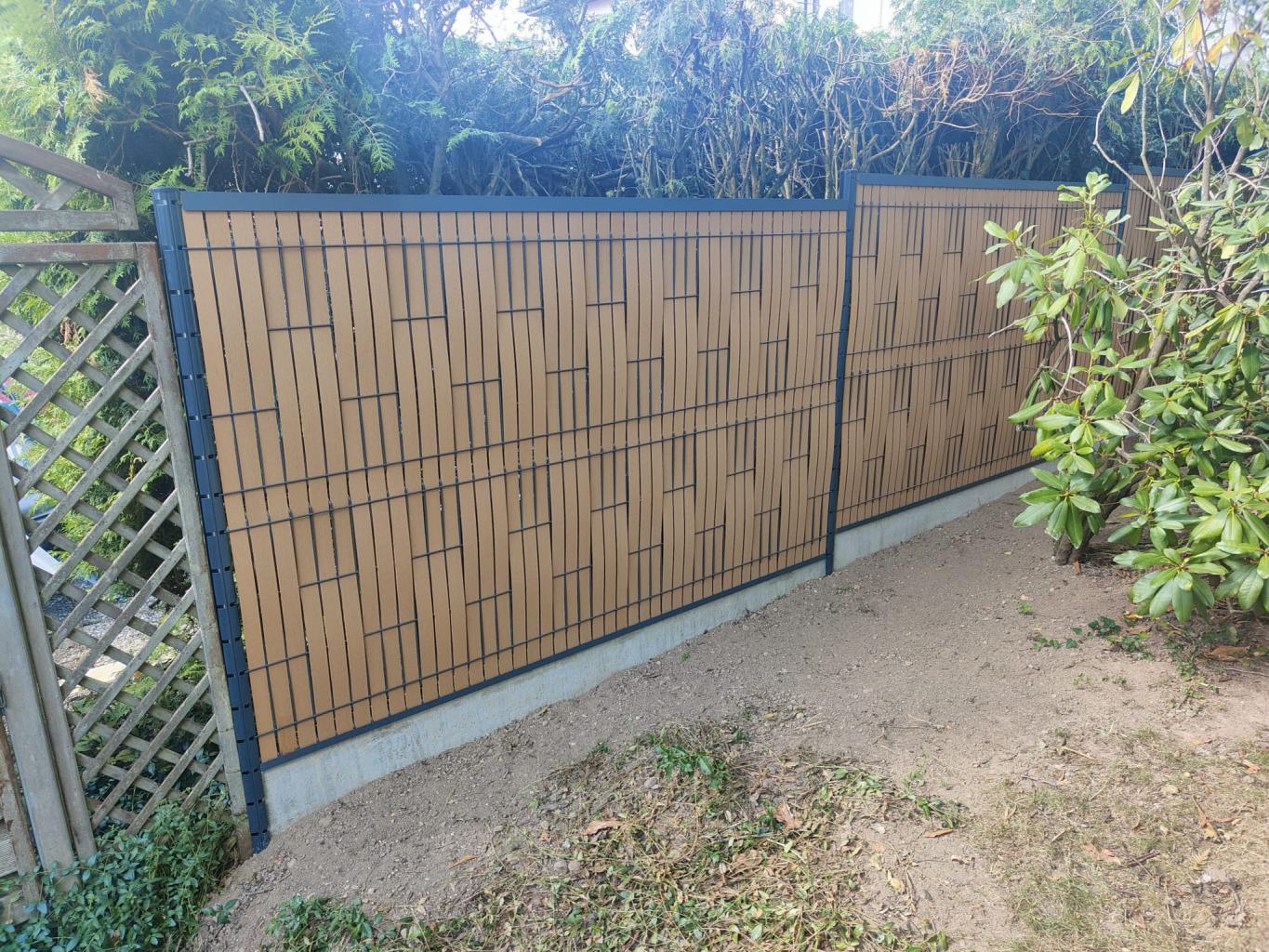 Clôture composite ou bois