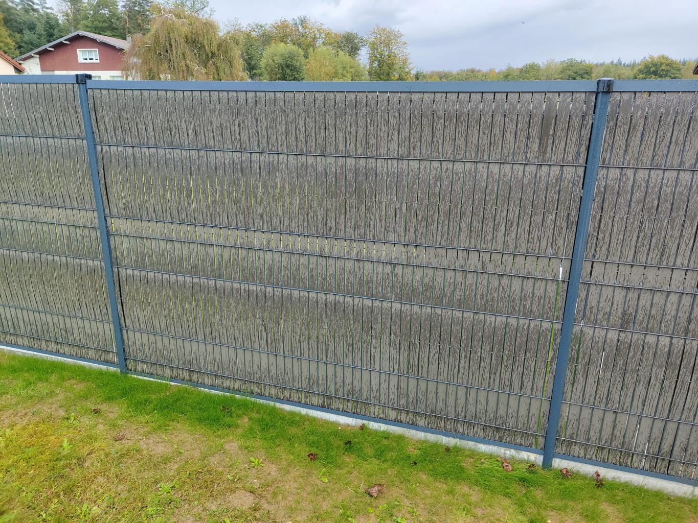 Clôture composite ou bois