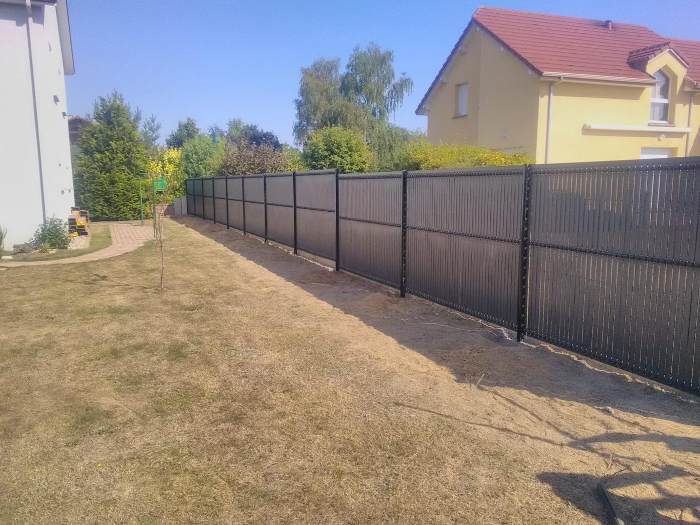 Clôture composite ou bois